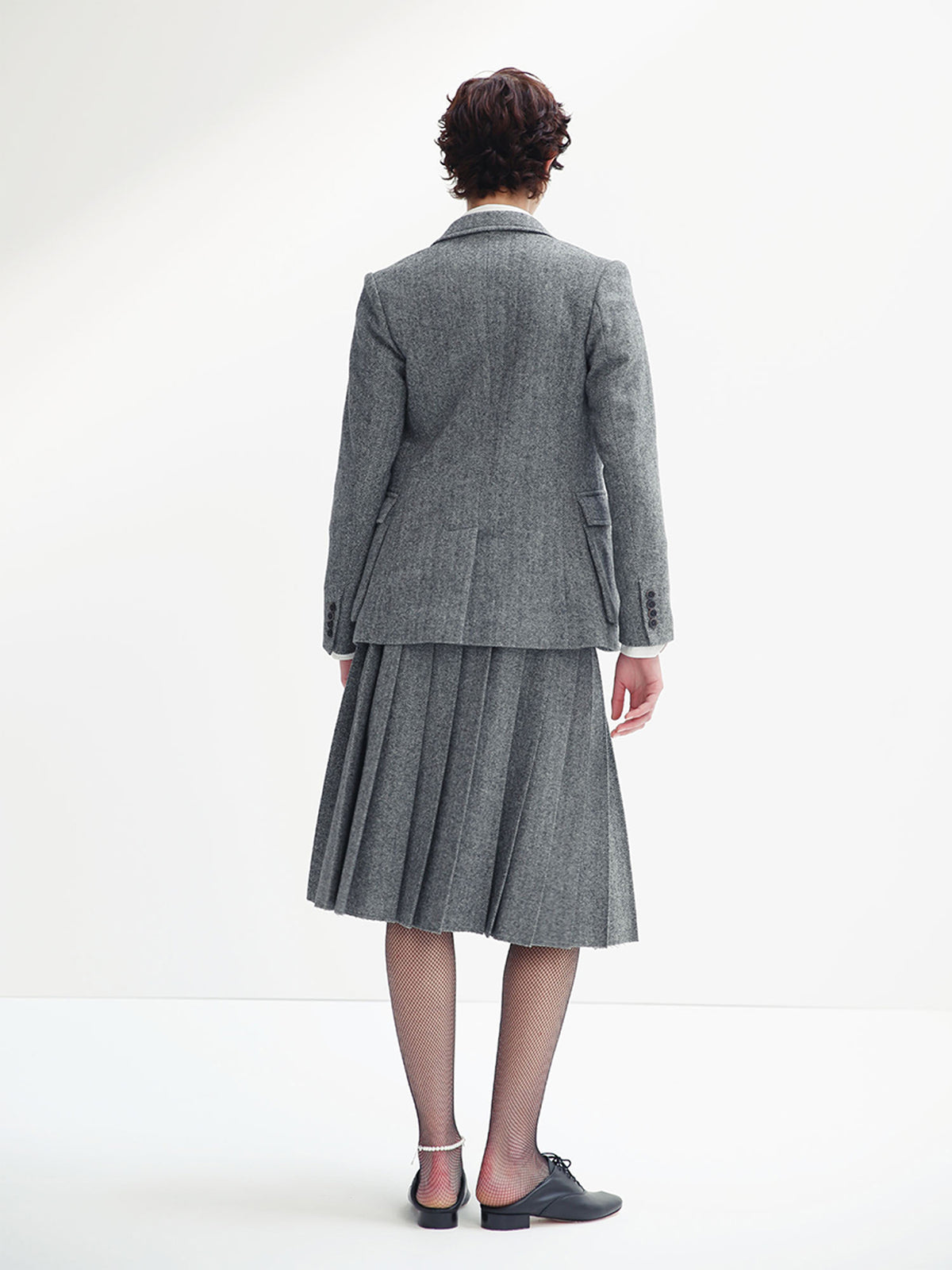 PLEATED WRAP SKIRT HERRINGBONE